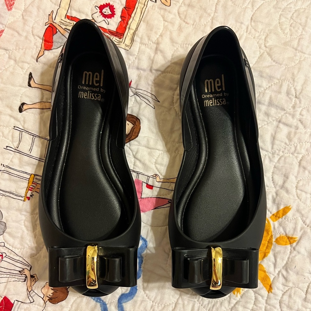 Mel Dreamed By Melissa Girls Size Black Flats with Gold Bow Detail